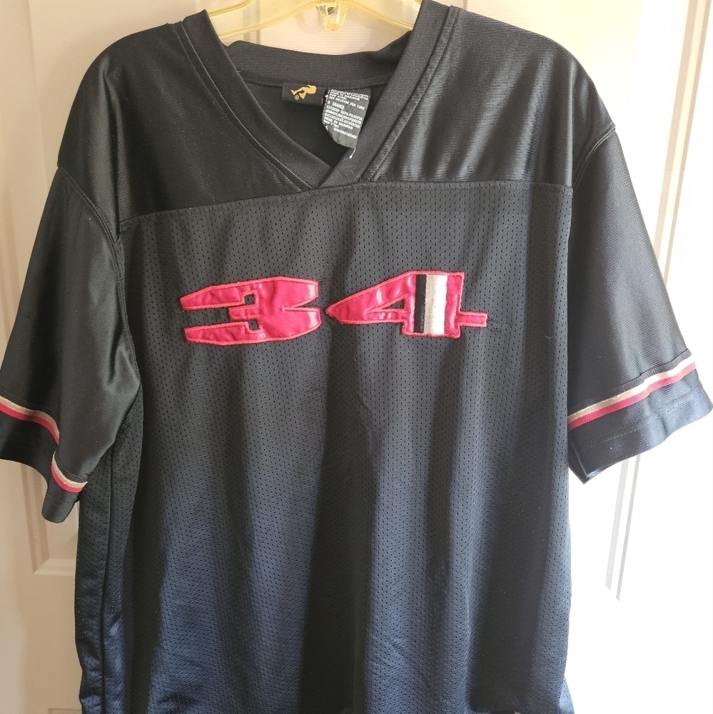 Shaq #34 short sleeve 100% polyster shirt.